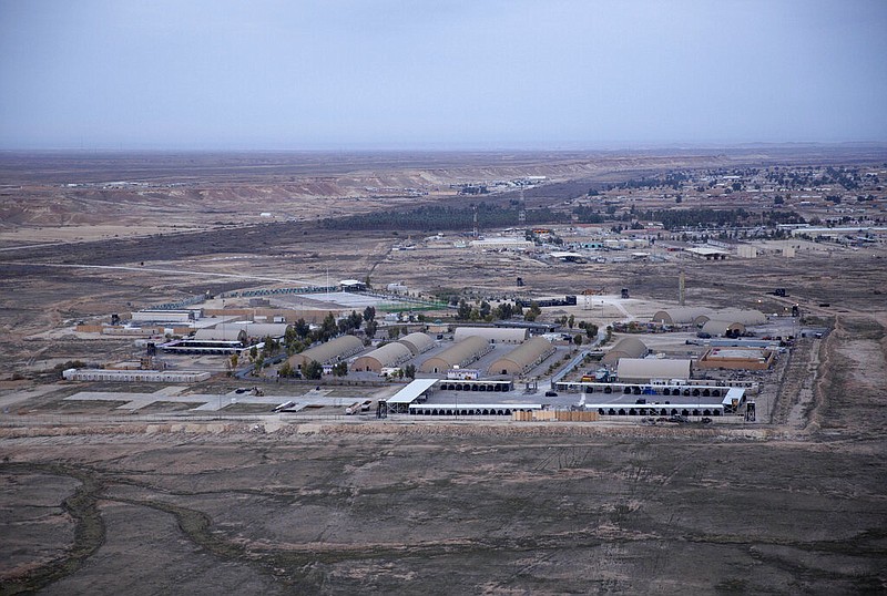 In this Sunday, Dec. 29, 2019 file photo taken from a helicopter shows Ain al-Asad air base in the western Anbar desert, Iraq. The Pentagon said Friday, Jan. 24, 2020, that 34 U.S. troops were diagnosed with traumatic brain injuries suffered in this month's Iranian missile strike on an Iraqi air base, and that half of the troops have returned to their military duties. Seventeen of the 34 are still under medical observation, according to Jonathan Hoffman, the chief Pentagon spokesman.