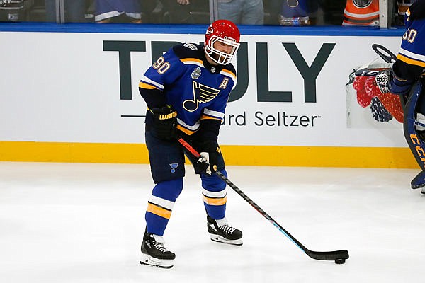 Blues forward Ryan O'Reilly wears a Chiefs helmet during warmups before Friday night's Skills Competition, part of the NHL All-Star weekend, in St. Louis.