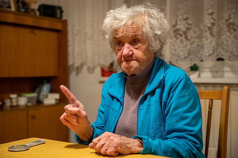 Nazi camps survivor Marija Frlan, who turns 100 on Holocaust Remembrance Day, talks to The Associated Press during an interview Friday, Jan. 24, 2020, at her home in Rakek, Slovenia. Frlan, who was held at the Ravensbruck camp in northern Germany for more than a year in 1944-45, will join other survivors and officials today in Poland for the ceremonies marking the 75th anniversary of the liberation of the Auschwitz camp.