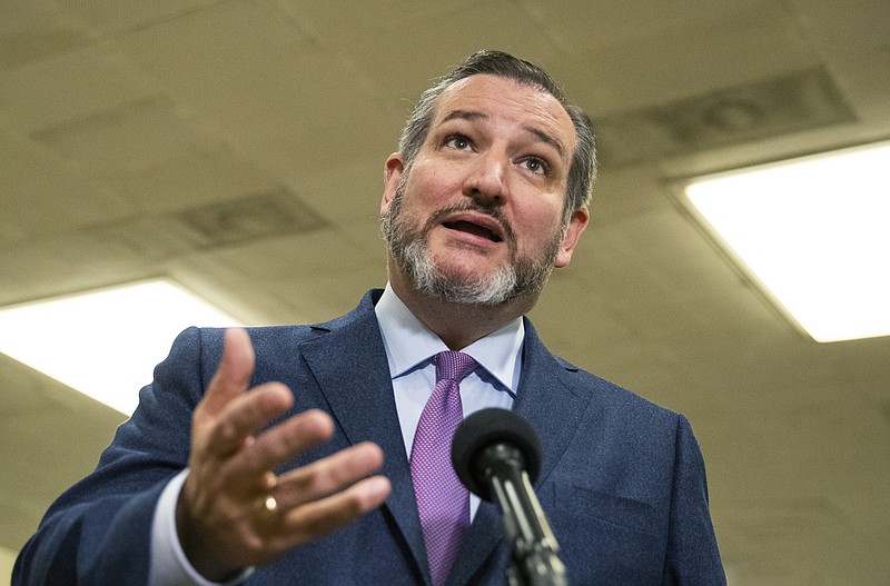 Sen. Ted Cruz, R-Texas, talks to reporters as he leaves the Capitol in Washington, Tuesday, Jan. 28, 2020. (AP Photo/Manuel Balce Ceneta)