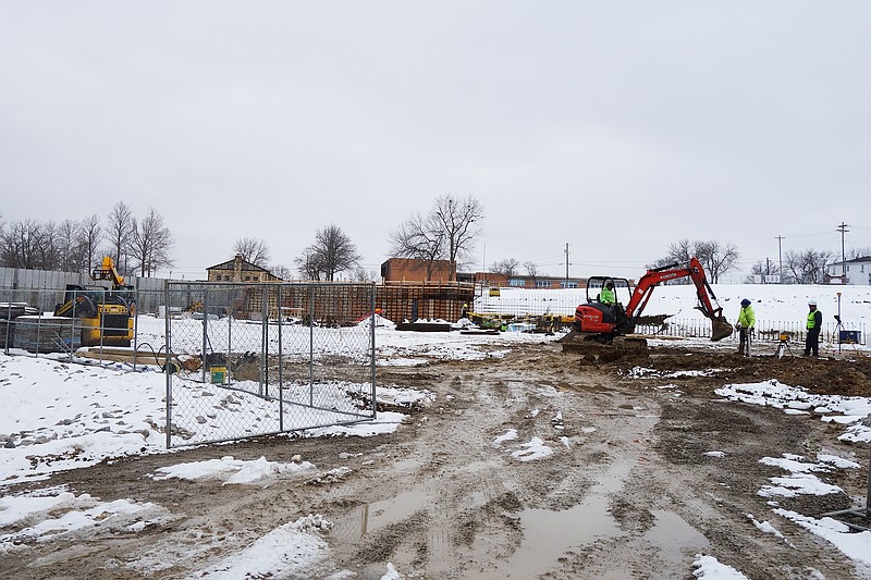 <p>Helen Wilbers/For the News Tribune</p><p>Progress continues at the future home of the Fulton community recreation center. Construction workers are currently pouring slabs and completing a wall near what will be the basketball courts.</p>