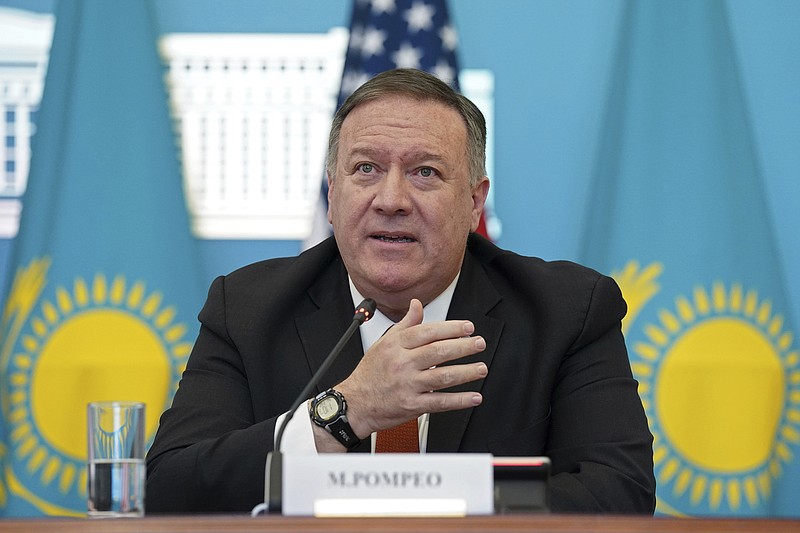 U.S. Secretary of State Mike Pompeo holds a joint news conference with Kazakh Foreign Minister Mukhtar Tleuberdi at the Ministry of Foreign Affairs in Nur-Sultan, Kazakhstan, Sunday, Feb. 2, 2020. (Kevin Lamarque/Pool Photo via AP)