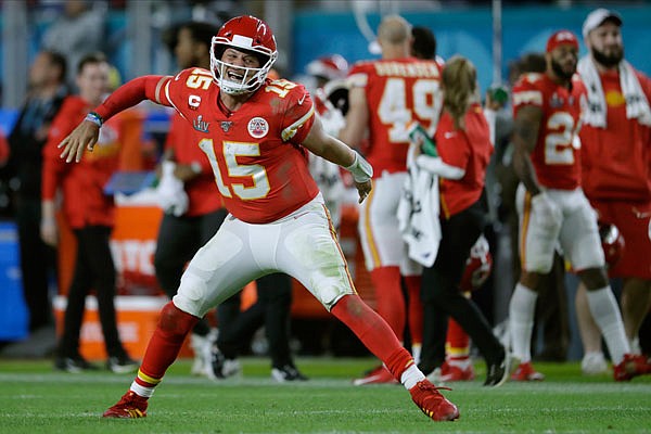 Chiefs' quarterback Patrick Mahomes celebrates his touchdown pass to  Damien Williams in the the fourth quarter of Super Bowl LIV against the 49ers on Sunday night in Miami Gardens, Fla.