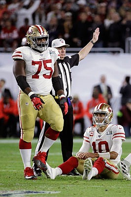 49ers quarterback Jimmy Garoppolo sits on the field after San Francisco turned the ball over on downs late in Sunday night's game against the Chiefs in Miami Gardens, Fla.