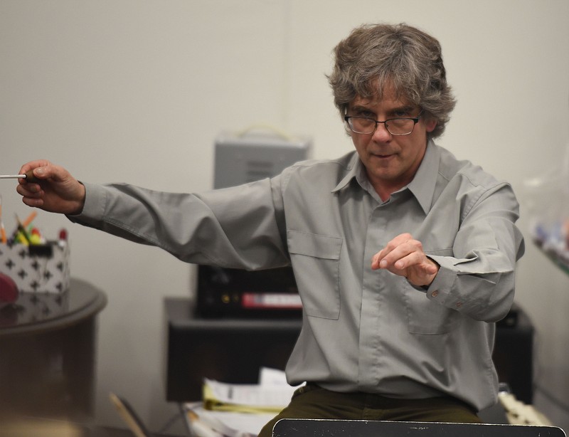 <p>Claire Hassler/News Tribune</p><p>Patrick Clark conducts during the Jefferson City Symphony Orchestra rehearsal on Monday, February 3, 2020 at Jefferson City High School. The concert features Bach, Henry Mancini, Aaron Copland, Duke Ellington and others.</p>