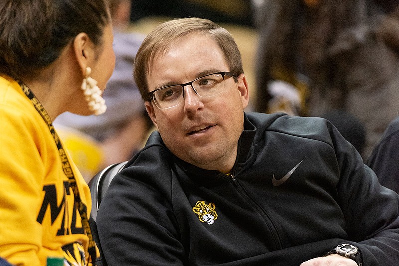 Missouri football coach Eliah Drinkwitz talks with a fan during a Tigers basketball game against Florida last month at Mizzou Arena.