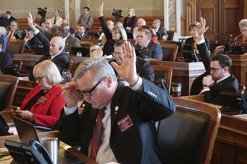 Republicans in the Kansas House indicate that they want a roll call vote on giving first-round approval to a proposed amendment to the state constitution on abortion, Thursday, Feb. 6, 2020, at the Statehouse in Topeka, Kan. The amendment would overturn a Kansas Supreme Court decision protecting abortion rights and has advanced to a final vote. (AP Photo/John Hanna)