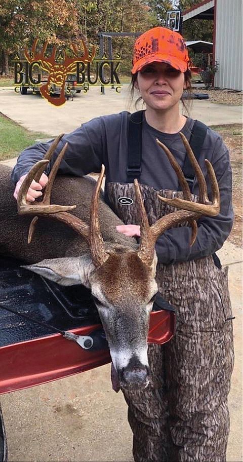 Area teacher Elizabeth "Liz" Bowman, who killed a 12-foot alligator last fall, is back in the news again after winning the Big Buck of Sevier County with  a 12-point buck. Bowman teaches fifth-grade social studies at Horatio Elementary. (Submitted photo)