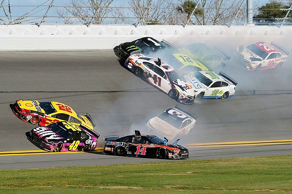 Joey Logano (22), Jimmie Johnson (48), Clint Bowyer (14) and Austin Dillon (3) are among the drivers involved in a multi-car wreck Sunday in the NASCAR Busch Clash at Daytona International Speedway in Daytona Beach, Fla.