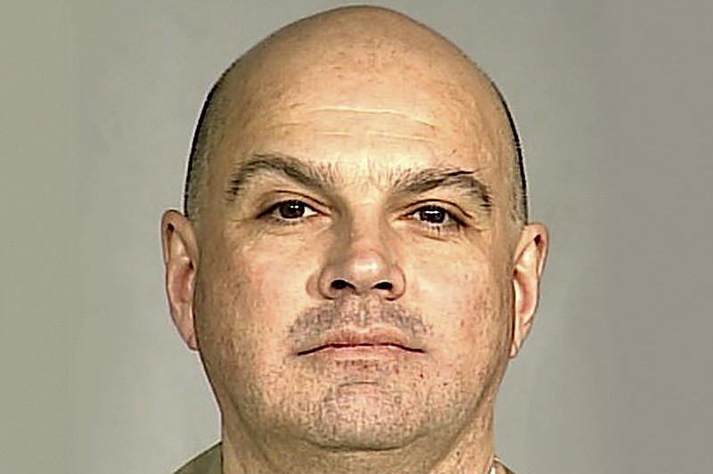 This undated photo provided by the U.S. Attorney's office shows Lawrence Ray, an ex-convict known for his role in a scandal involving former New York police commissioner Bernard Kerik. Ray was charged Tuesday, Feb. 11, 2020, with federal extortion and sex trafficking charges involving a group of students at Sarah Lawrence College. (U.S. Attorney's office via AP)