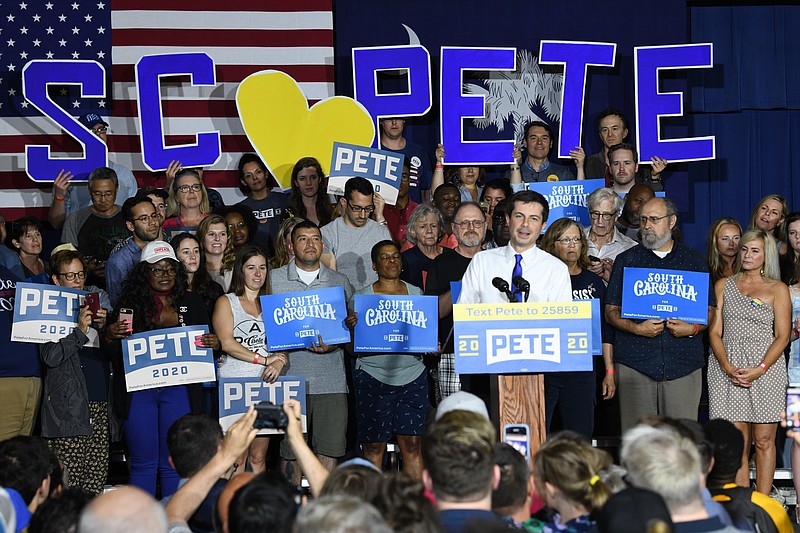 FILE - In this May 5, 2019 file photo, Democratic presidential contender Pete Buttigieg holds a town hall in North Charleston, South Carolina. Democratic presidential contender Pete Buttigieg is picking up his first endorsement among South Carolina’s black lawmakers as attention in the early voting contest turns toward more diverse states. Buttigieg‘s campaign announced Wednesday that the former South Bend, Indiana, mayor would be receiving backing from state Rep. JA Moore, a Democrat from Charleston. (AP Photo/Meg Kinnard)