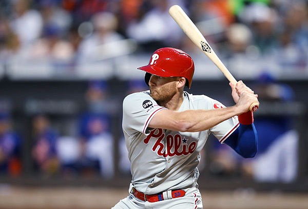 In this Sept. 7, 2019, file photo, Brad Miller of the Phillies bats during the first inning of the team's game against the Mets in New York.