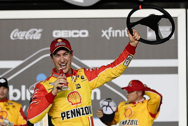 Joey Logano celebrates in victory lane after winning the first of the two NASCAR Daytona 500 qualifying races Thursday at Daytona International Speedway in Daytona Beach, Fla.