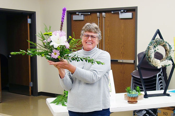 Rose Bradley demonstrated Wednesday how to create an Inverted T floral arrangement during the Fulton Garden Club meeting. This year's FGC flower show is April 28.