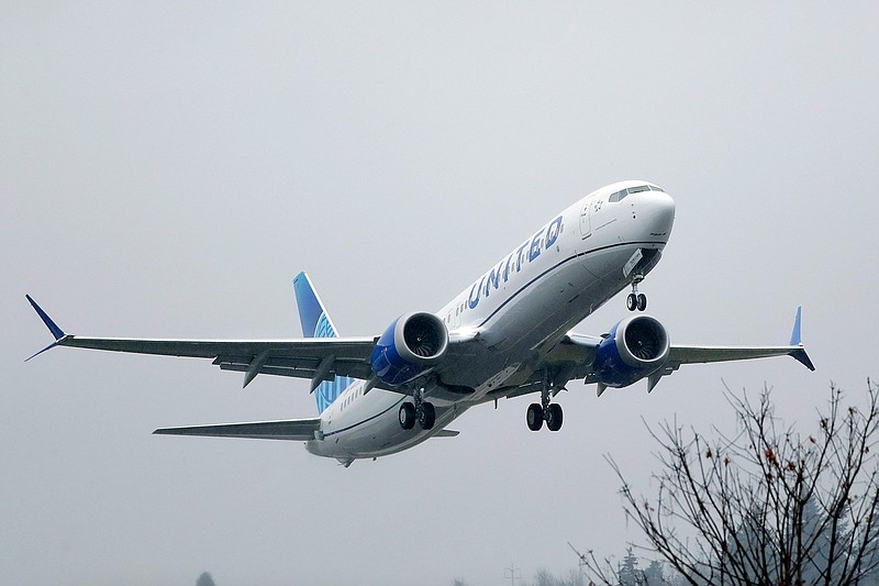 In this Dec. 11, 2019, file photo, an United Airlines Boeing 737 Max airplane takes off in the rain at Renton Municipal Airport in Renton, Wash. United Airlines said Friday, Feb. 14, 2020, that it is removing the grounded Boeing 737 Max from its schedule until early September, forcing it to cancel thousands more flights. (AP Photo/Ted S. Warren, File)