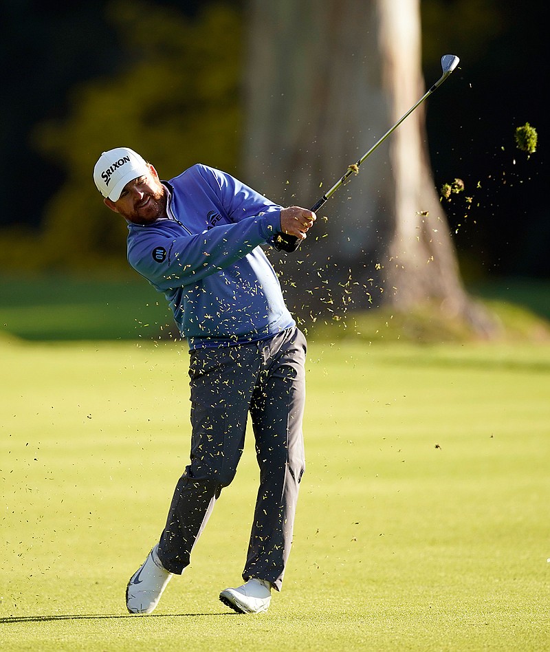 J.B. Holmes hits his approach shot on the 13th hole during the second round of the Genesis Invitational golf tournament at Riviera Country Club, Friday, Feb. 14, 2020, in the Pacific Palisades area of Los Angeles. (AP Photo/Ryan Kang)