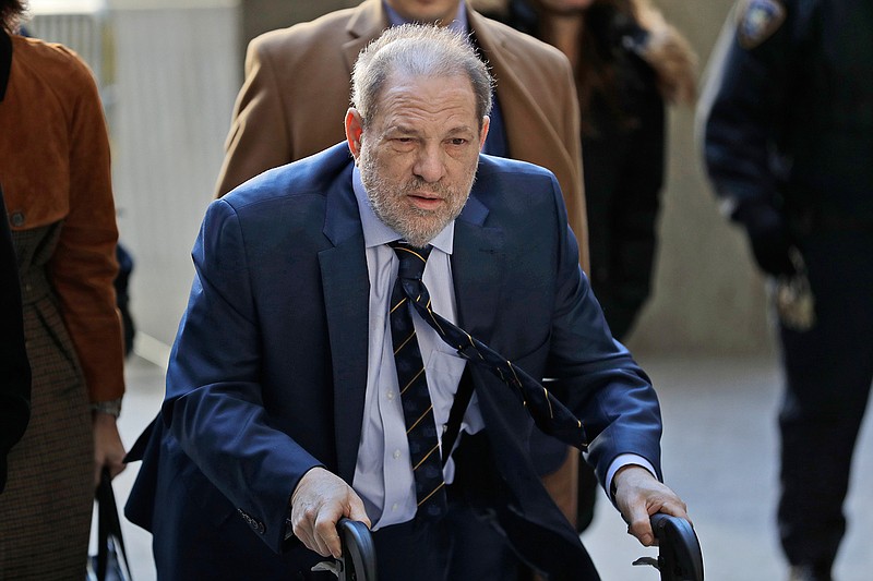 Harvey Weinstein arrives at a Manhattan courthouse for his rape trial in New York, Friday, Feb. 14, 2020. (AP Photo/Seth Wenig)