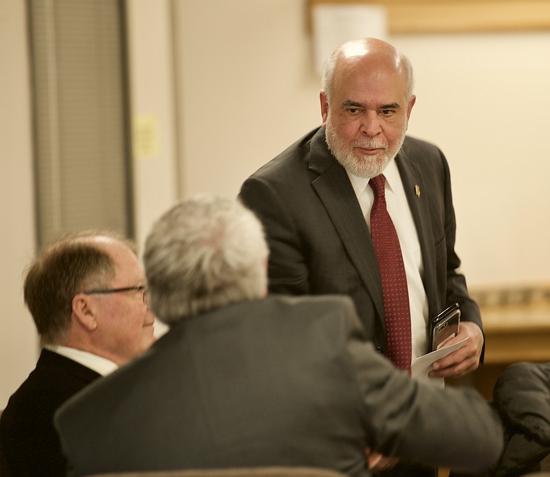 Mark Stringer, director of Missouri Department of Mental Health, greets people Thursday, Feb. 13, 2020, before a Mental Health Commission meeting.