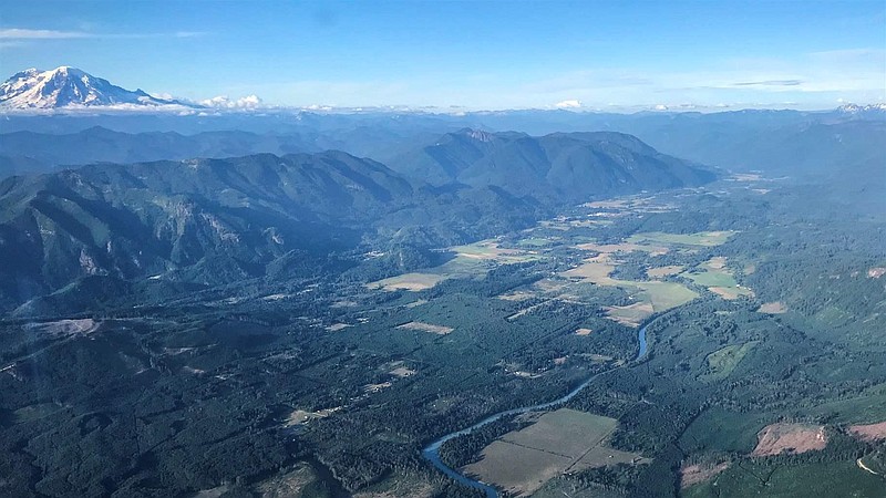 The Cowlitz River flows near Randle, Washington, where residents have opposed a plan by Crystal Geyser to build a water bottling plant along the river and pump 400 gallons a minute from nearby springs. (Courtesy of Craig Jasmer/Pew Charitable Trusts/TNS)