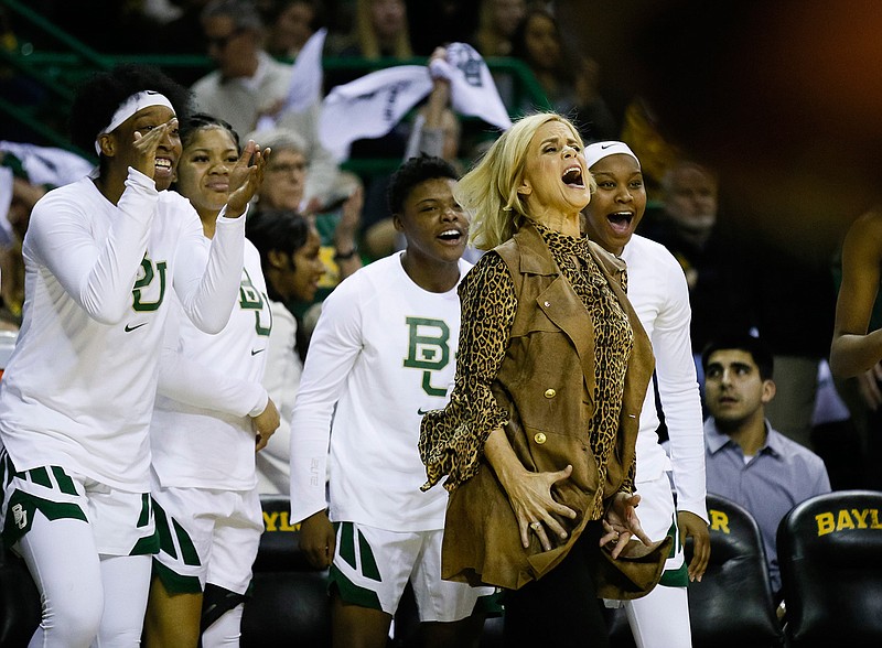 In this Jan. 3, 2019, file photo, Baylor coach Kim Mulkey reacts in front of the bench to a blocked shot during the team's NCAA college basketball game against Connecticut in Waco, Texas. Mulkey has long defended her program's distinctive nickname, which certainly hasn't been a drag on the team's success. The Lady Bears have won three national titles over the past eight seasons and are positioned to make a run for another championship. (AP Photo/Ray Carlin, File)