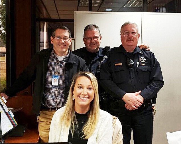 Megan Turney, TC Police Department Dispatcher
Back row: TCPD Chief of Police Stephen Gass, TCPD Officer Vick Thornburg,
and TCPD Officer Damon Lynn
 