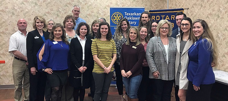 Rotarians and representatives of local nonprofits pose for a photo at a meeting of the Oaklawn Rotary Club on Feb. 18, 2020, in Texarkana, Texas. The club donated $600 to each of 11 nonprofits.