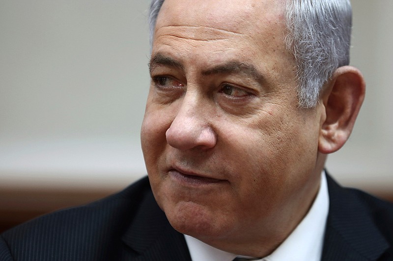 Israeli Prime Minister Benjamin Netanyahu chairs the weekly cabinet meeting, in Jerusalem, Sunday, Feb. 16, 2020. (Gali Tibbon/Pool via AP)