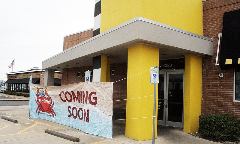 The former Buffalo Wild Wings building is shown Feb. 19, 2020, at 4320 St. Michael Drive in Texarkana, Texas. A franchise restaurant called The Juicy Seafood is "coming soon" to the location, according to a sign outside.