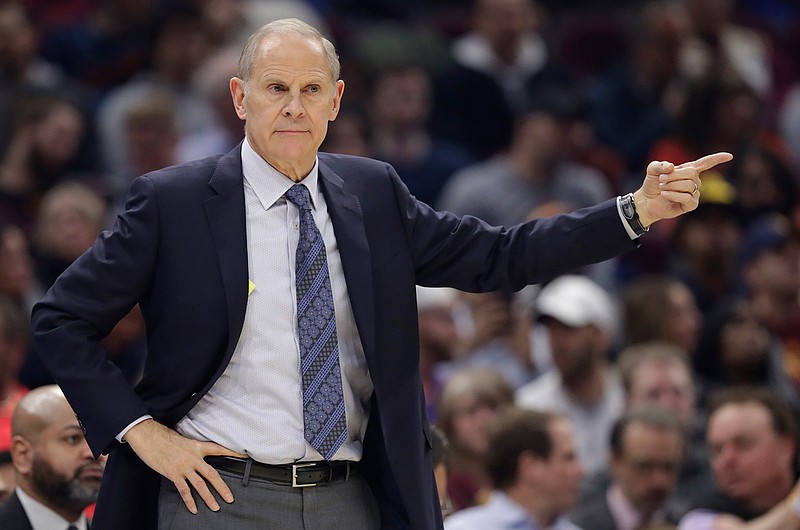 In this Friday, Dec. 20, 2019 file photo, Cleveland Cavaliers head coach John Beilein gives instructions to players in the first half of an NBA basketball game against the Memphis Grizzlies in Cleveland. Cavaliers first-year coach John Beilein will end a rough season by stepping down after 54 games, according to multiple reports Tuesday, Feb. 18, 2020.(AP Photo/Tony Dejak, File)