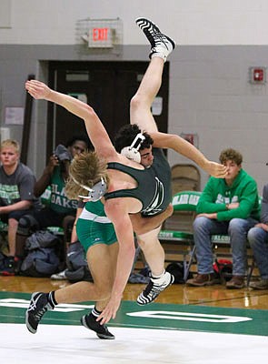 Eli Batiste of Blair Oaks throws Grant Wright of North Callaway to the mat during a dual this season.