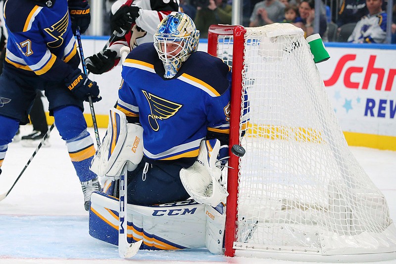 Blues goalie Jordan Binnington makes a save against the Coyotes during Thursday night's game in St. Louis. 