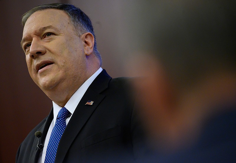 This Feb. 19, 2020 file photo shows U.S. Secretary of State Mike Pompeo at a news conference at the United Nations Economic Commission for Africa, in Addis Ababa, Ethiopia.  The countdown to the signing of a peace agreement between the Taliban and the United States to end the 18 years of war in Afghanistan will begin on Friday night, when the seven-day "reduction of violence" promised by the Taliban will go into effect, a senior U.S. State Department official said. The deal will be signed on Feb. 29.(Andrew Caballero-Reynolds/Pool via AP)