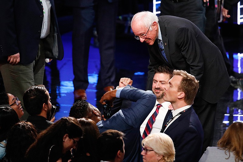 Democratic presidential candidate, Sen. Bernie Sanders, I-Vt., greets guests after a Democratic presidential primary debate Wednesday, Feb. 19, 2020, in Las Vegas, hosted by NBC News and MSNBC. (AP Photo/John Locher)