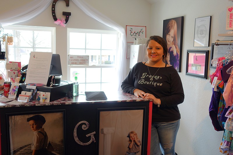 <p>Democrat photo/Paula Tredway</p><p>Shawnna Willis opened Gracey’s Boutique on Saturday to bring children’s clothing to California. The boutique is full of boys and girls clothing and accessories, natural products and some home decor pieces.</p>