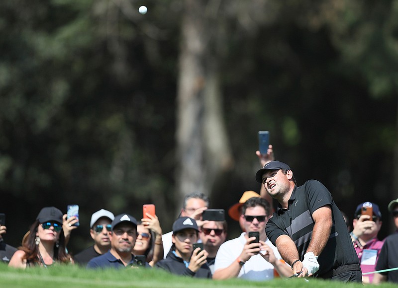  Patrick Reed of the United States approaches the third green during the final round for the WGC-Mexico Championship on Sunday at the Chapultepec Golf Club in Mexico City.