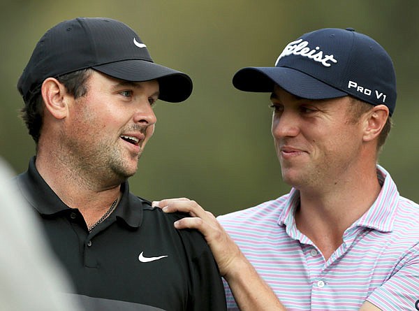 Patrick Reed (left) is congratulated by Justin Thomas after winning the WGC-Mexico Championship on Sunday at the Chapultepec Golf Club in Mexico City.