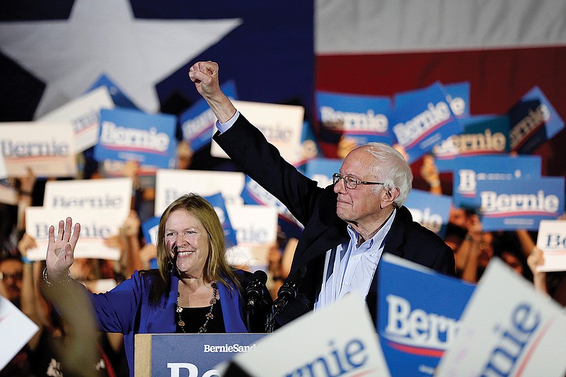 Democratic presidential candidate Sen. Bernie Sanders, I-Vt., right, with wife Jane, speaks Saturday during a campaign event in San Antonio.