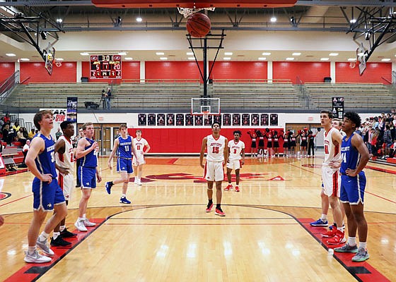 Sterling DeSha of the Jays watches his free throw go through the net during Friday night's game against Rockhurst at Fleming Fieldhouse.