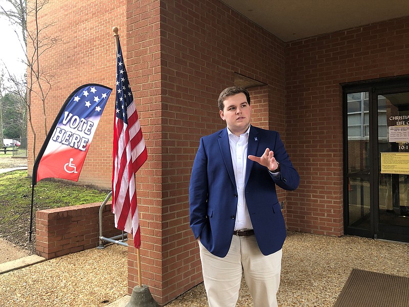 University of Memphis student Landon Shelby speaks with a reporter outside an off-campus voting location on Tuesday, Feb. 25, 2020, in Memphis, Tenn. Shelby, a Republican, said he would like to see the university have a polling location on campus to help students cast ballots more easily. (AP Photo/Adrian Sainz)