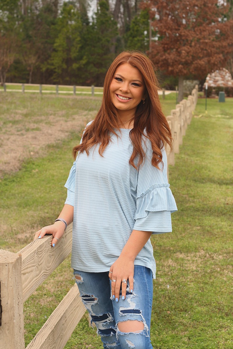 Madison Allen wearing Blue & Breezy top from Modern Moxie Boutique in Texarkana. (Photo by Katie Stone)