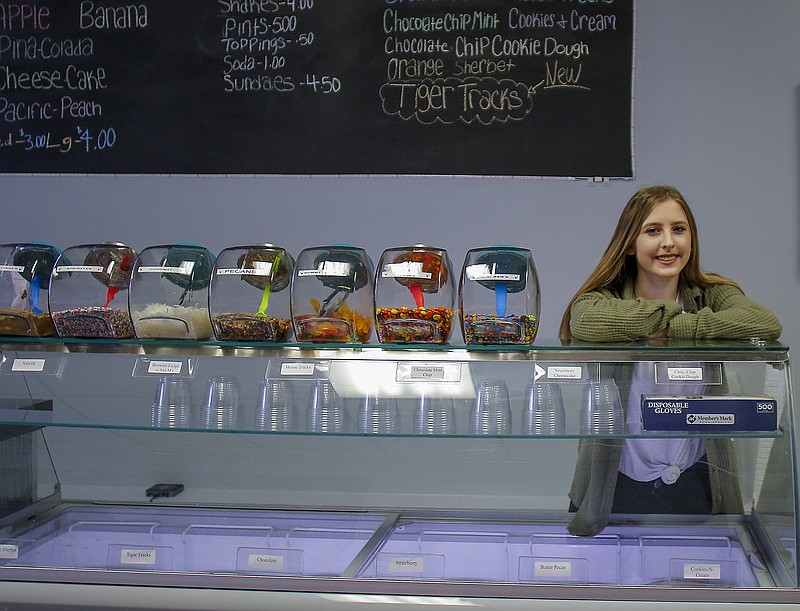 Liv Paggiarino/News Tribune

Fifteen-year-old Shelby Mell stands behind the counter of her ice cream shop, Mellby’s Chill Zone, on Feb. 27 in Holts Summit. The shop is now open on Sundays but will have its grand opening on Shelby’s 16th birthday in March.