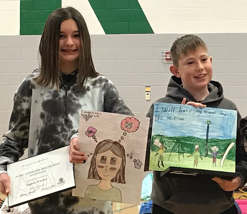 Sophia Warner, left, and Zach Moreland, seventh graders at Blair Oaks Middle School, submitted winning posters in Level 2 of the Jefferson City Optimist Club's substance abuse poster contest.