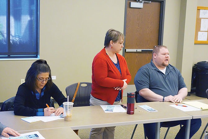 Shannon Kimsey, center, and Carl Bimm, of the Fulton Community Supervision Center, gave an update during Thursday's Community Resource Network meeting. The CSC is currently seeking out partners to provide classes for residents.