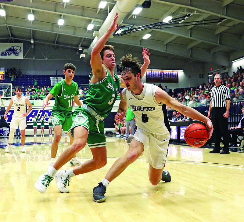 Jake Closser of Blair Oaks defends Cole Gilpin of Fair Grove during last Saturday night's Class 3 quarterfinal game at Southwest Baptist in Bolivar.