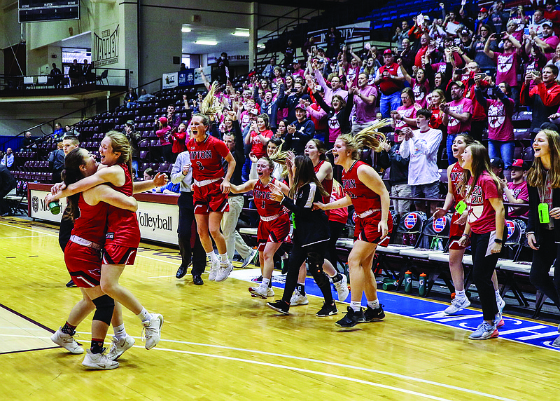 Emma Braby (left) hugs Tipton teammate Myra Claas following the Lady Cardinals' 58-43 win Friday night against Blue Eye in the Class 2 semifinals at Hammons Student Center in Springfield.