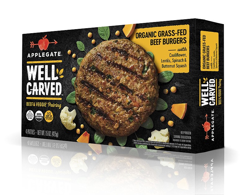 This undated photo provided by Applegate Farms shows Applegate Well Carved Organic Grass-Fed Beef Burgers, a line of meat-and-veggie burgers which the company is introducing at grocery stores next month.  (Applegate Farms via AP)