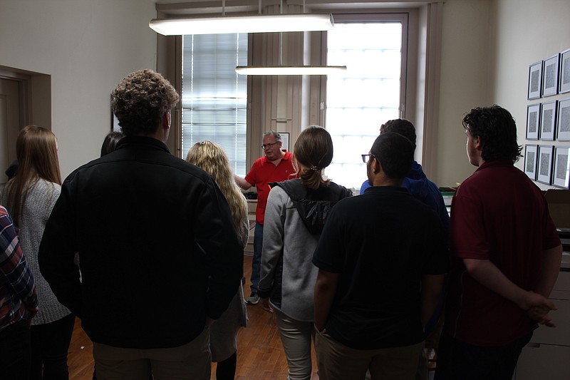 <p>Democrat photo/Austin Hornbostel</p><p style="text-align:right;">Students gather in County Assessor Bill Figgins’ office at the courthouse to learn more about his position. Jamestown and Tipton sophomores and juniors learned the ins and outs of county government last Thursday at the American Legion’s eighth annual Moniteau County Government Day in California. Participants heard from county officials regarding their duties, met delegates from their student bodies that attended last year’s American Legion Missouri Boys and Girls State programs, and more. </p><p style="text-align:right;">Theyheard a presentation from historian Jeremy Amick, and toured Moniteau County officials’ offices in and around the courthouse.</p>