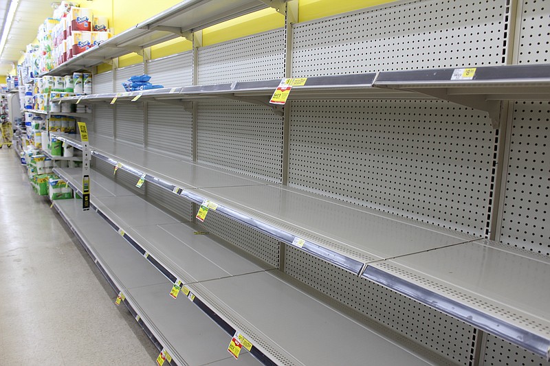<p>Democrat photo/Austin Hornbostel</p><p>Shelves at the California Dollar General were cleared of toilet paper by mid-afternoon Friday. At Cal’s and C&R Supermarket, toilet paper on store shelves only lasted through part of the weekend — shelves were similarly empty Monday morning.</p>