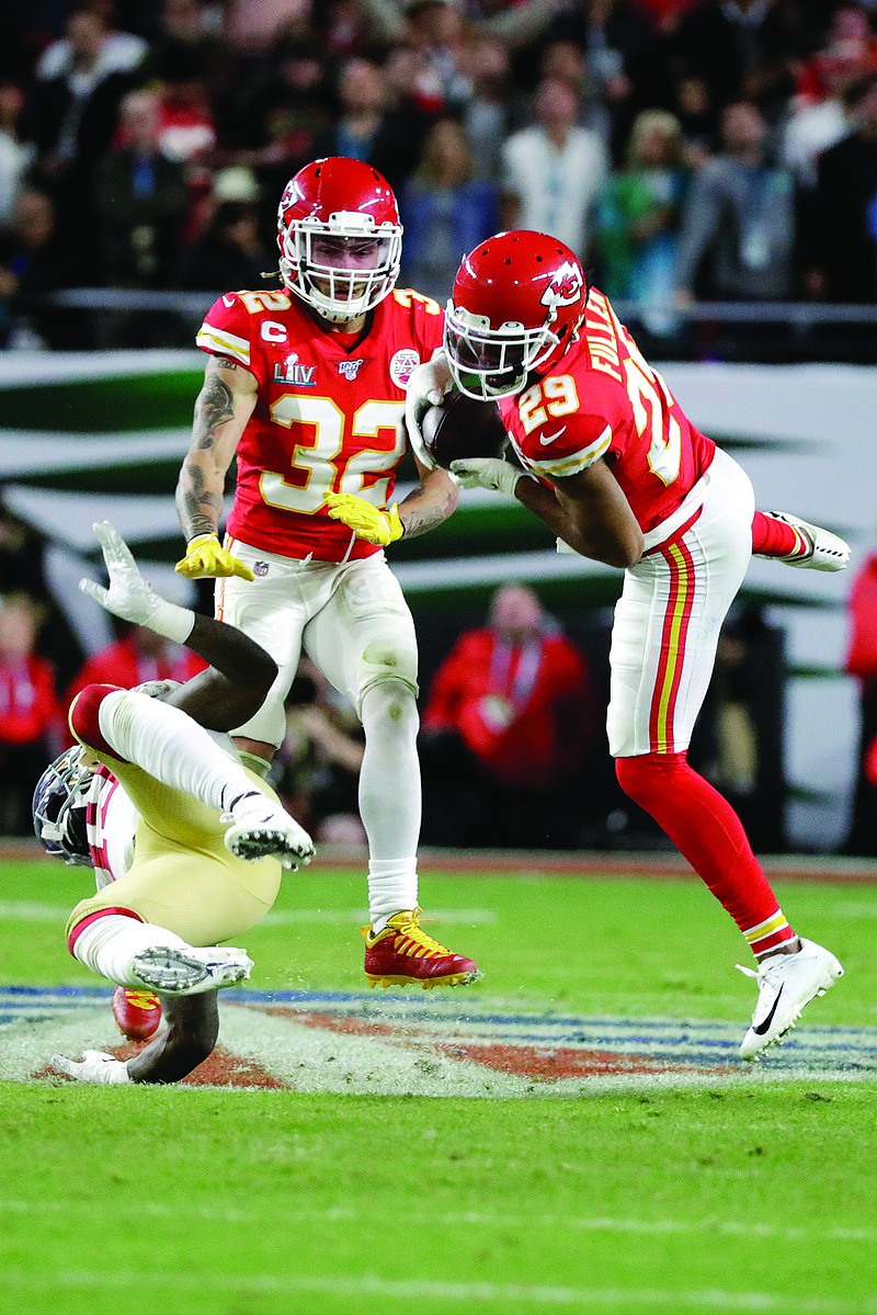 Chiefs cornerback Kendall Fuller intercepts a pass next to 49ers receiver Deebo Samuel during the second half of Super Bowl LIV in Miami Gardens, Fla. Fuller, a free agent, has left the Chiefs to sign with the Redskins.