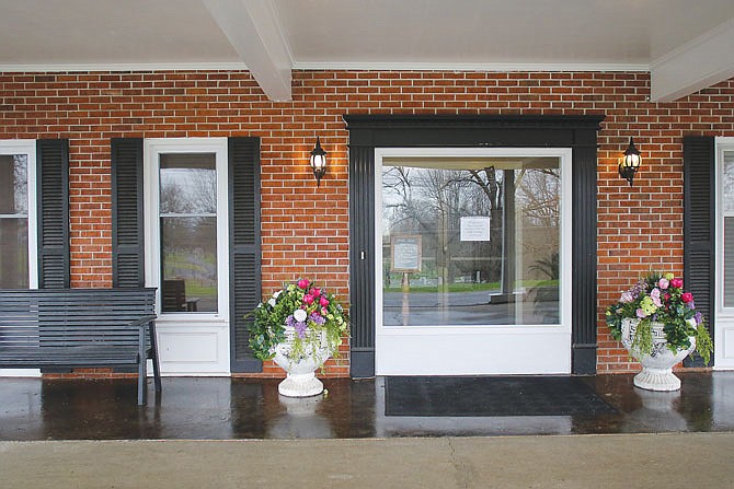 The front entrance to Millard Family Chapels has been converted to a drive-up visitation area for those who would like to hold visitations of deceased loved ones but still heed state government recommendations about avoiding gatherings of 50 or more people to slow the spread of coronavirus. 